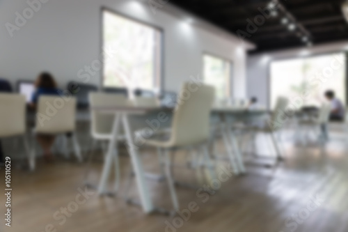 student use computer to access to internet for education  blurry
