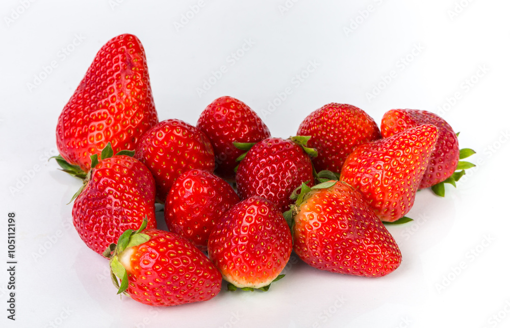 Strawberries with leaves. Isolated on a white background. Strawberries with leaves. Isolated on a white background.