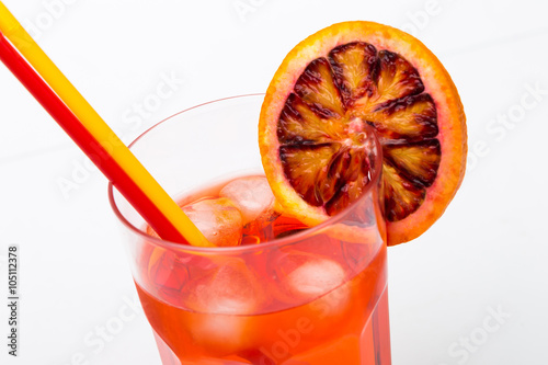 Aperol spritz aperitif alcoholic cocktail with orange slices and photo