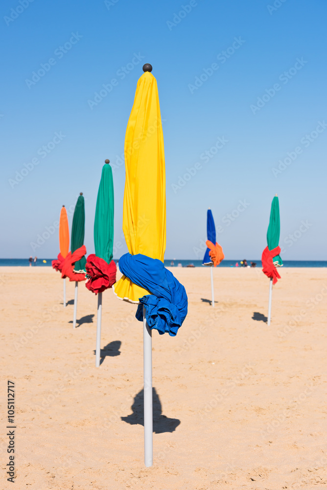 The famous colorful parasols on Deauville beach