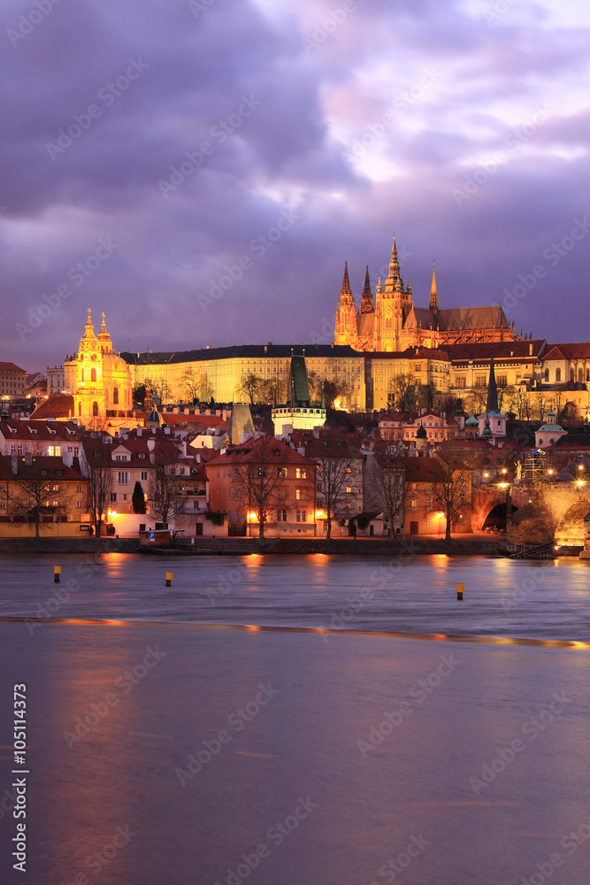 Colorful Prague gothic Castle above the River Vltava with Charles Bridge in the Evening, Czech Republic
