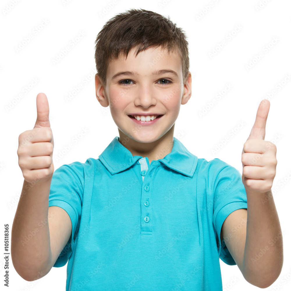 Happy teen boy showing thumbs up gesture Stock Photo | Adobe Stock