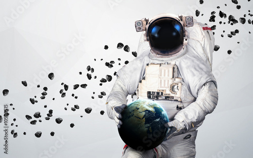 Fototapeta Naklejka Na Ścianę i Meble -  Astronaut in outer space modern art. Elements of this image furnished by NASA.