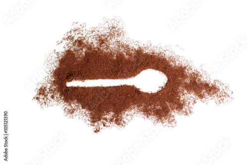 Spoon trace in ground coffee.