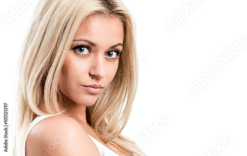 Portrait of a beautiful young woman on a white background