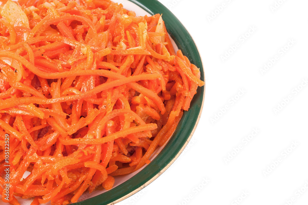 Korean carrots in plate on a white background Korean carrots in plate on a white background