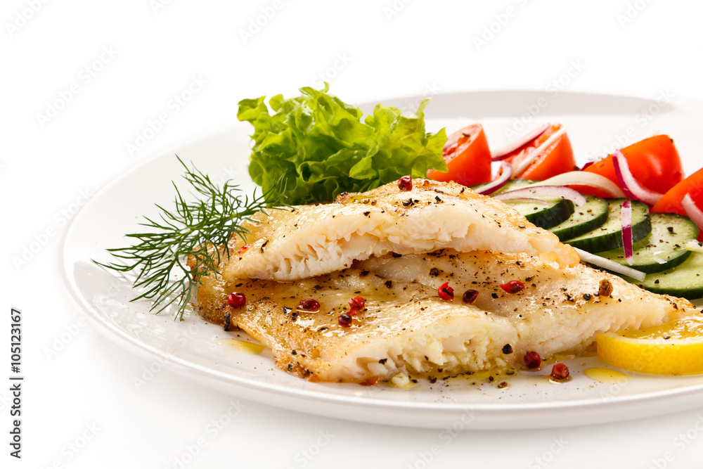 Fish dish - roast cod fillet and vegetables Fish dish - roast cod fillet and vegetables