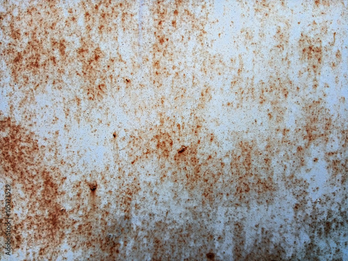 closeup of old iron plate with rusty