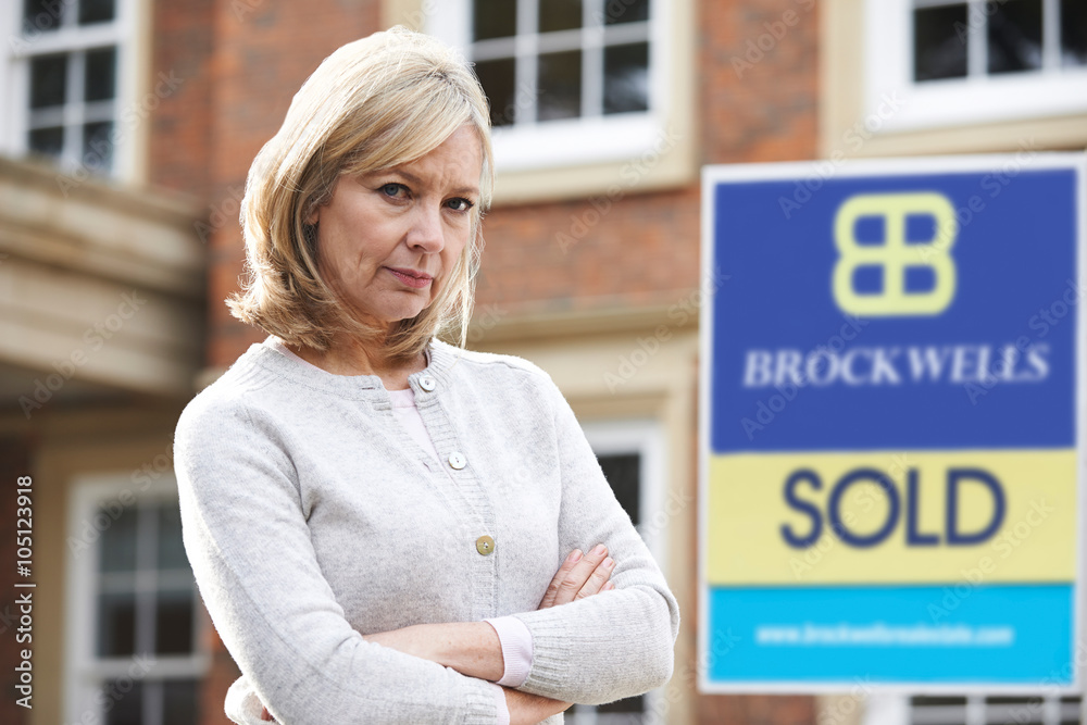 Fototapeta premium Mature Woman Forced To Sell Home Through Financial Problems
