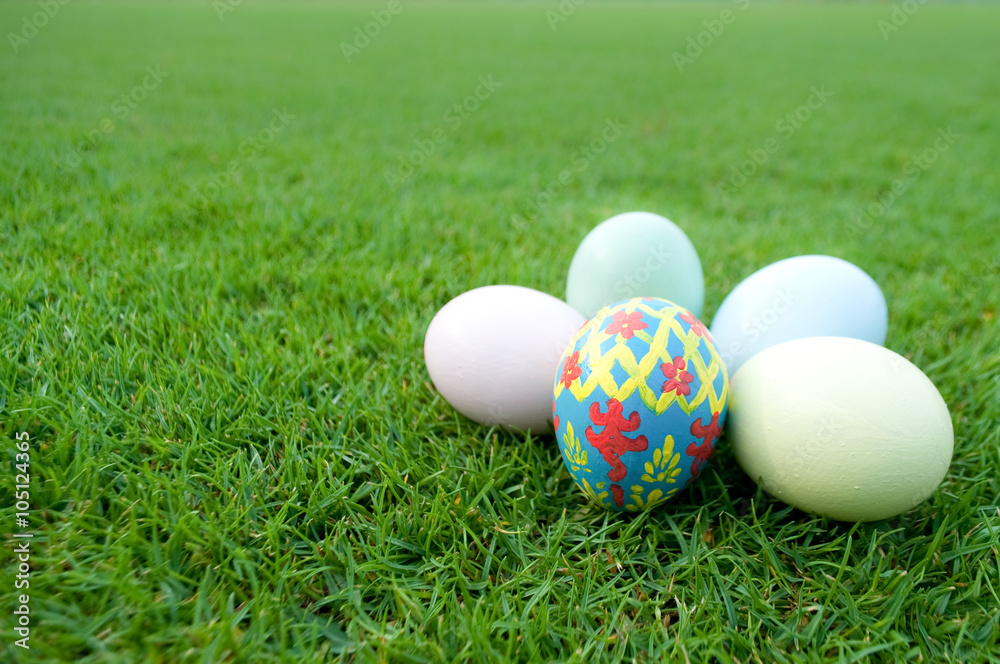 Easter eggs on green lawn