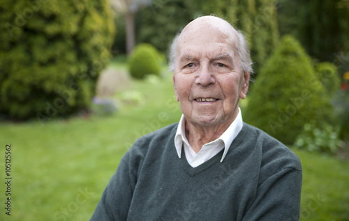 Portrait of 95 years old english man in his garden