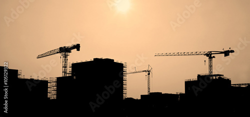 Obraz na płótnie Construction site at sunset w salonie