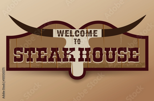Wild West sign. Retro wooden sign. Steakhouse sign