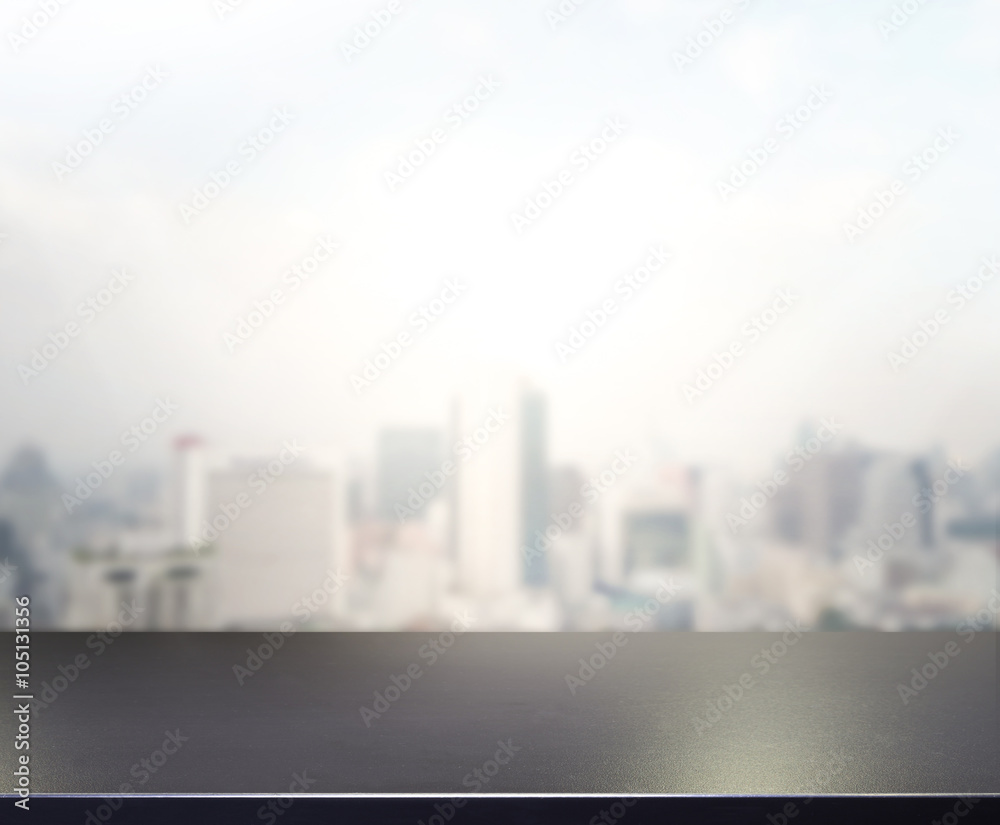 Table Top And Blur Building Of Background