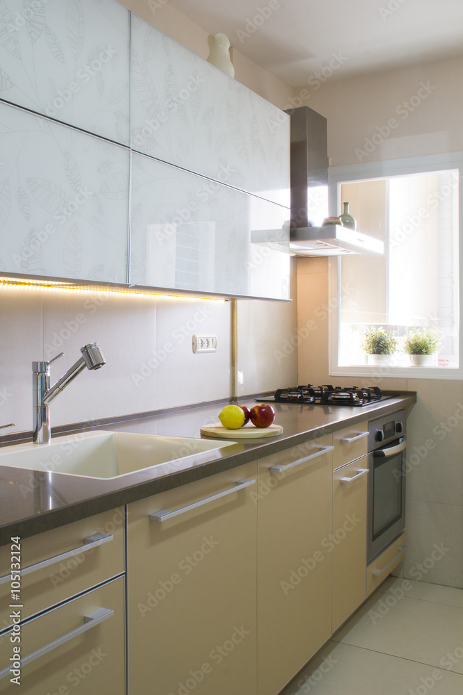 Modern kitchen in beige and cream colors Modern kitchen in beige and cream colors