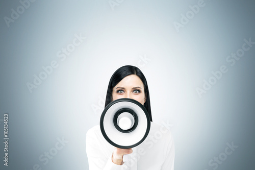 Woman with loudspeaker