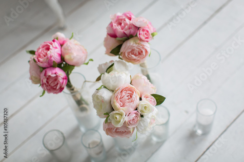 pink white flowers in vases