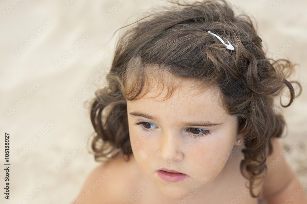 Kid playing with the sand. Kid playing with the sand.