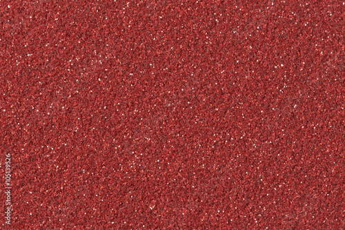 Abstract red Christmas glitter background. Low contrast photo.