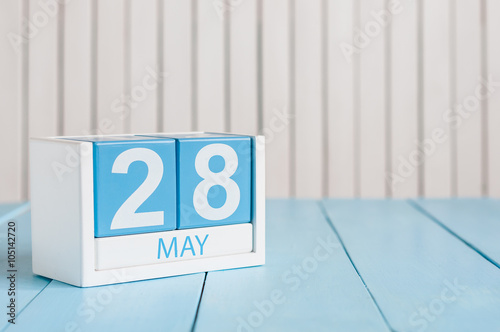 May 28th. Image of may 28 wooden color calendar on white background.  Spring day, empty space for text photo