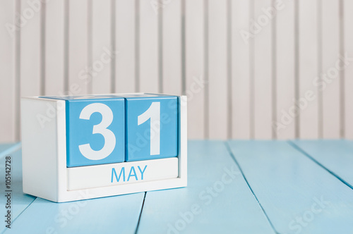 May 31st. Image of may 31 wooden color calendar on white background.  Last spring day, Spring end. Empty space for text. World blondes Day