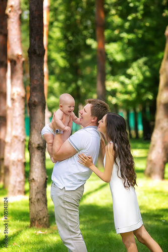 beautiful family with a baby in the park © anna_burlakova