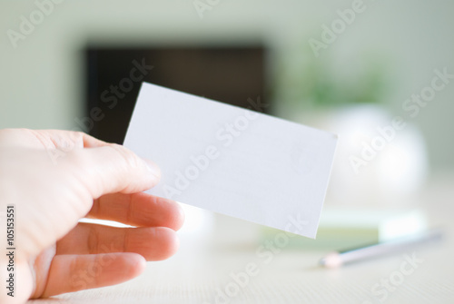 blank card in office background
