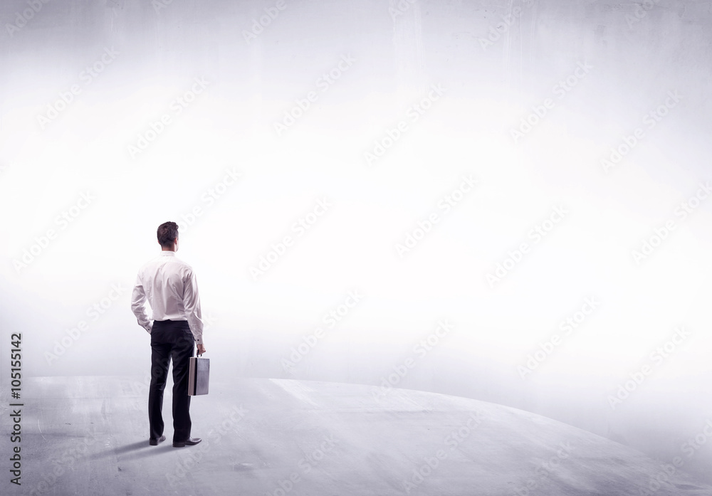 Business person standing from rear view Business person standing from rear view