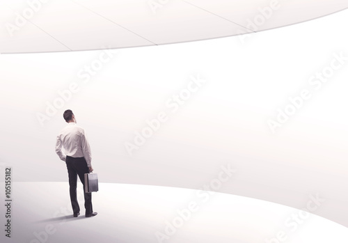 Salesman standing with his back concept © ra2 studio