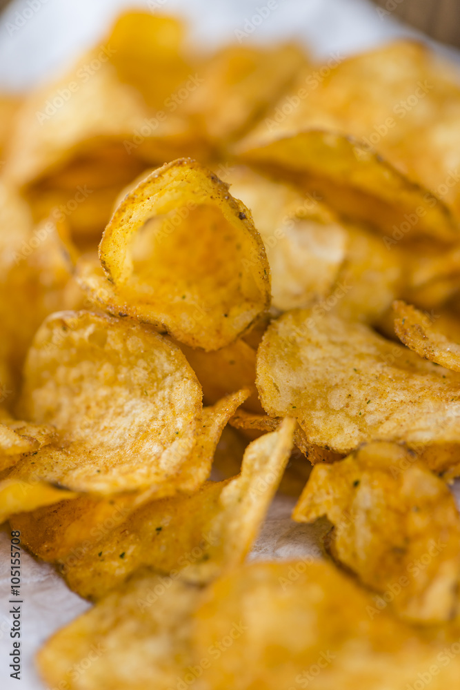Portion of crispy Potato Chips (selective focus) Portion of crispy Potato Chips (selective focus)
