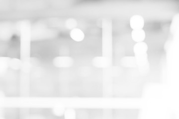 abstract white and gray bokeh lights background with motion blur