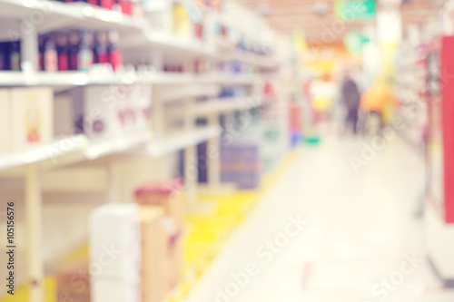 blurred interior of supermarket - abstract background. vintage retro color filter