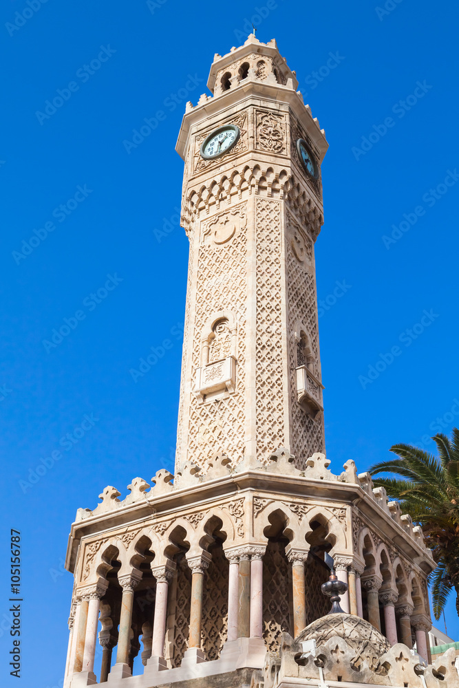 Old clock tower under blue sky, Izmir, Turkey