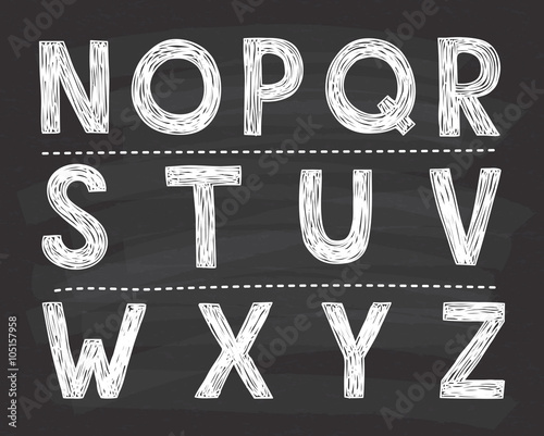 alphabet doodle on chalkboard background