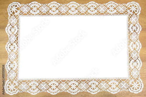 White openwork lace   on wooden background