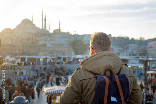 Photography The young man looks at traveling Mosque in Istanbul
