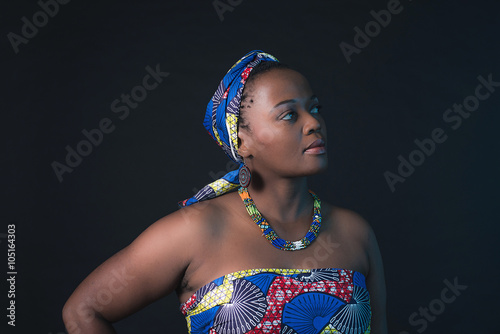 Young south african xhosa woman wearing colorful fabrics. photo