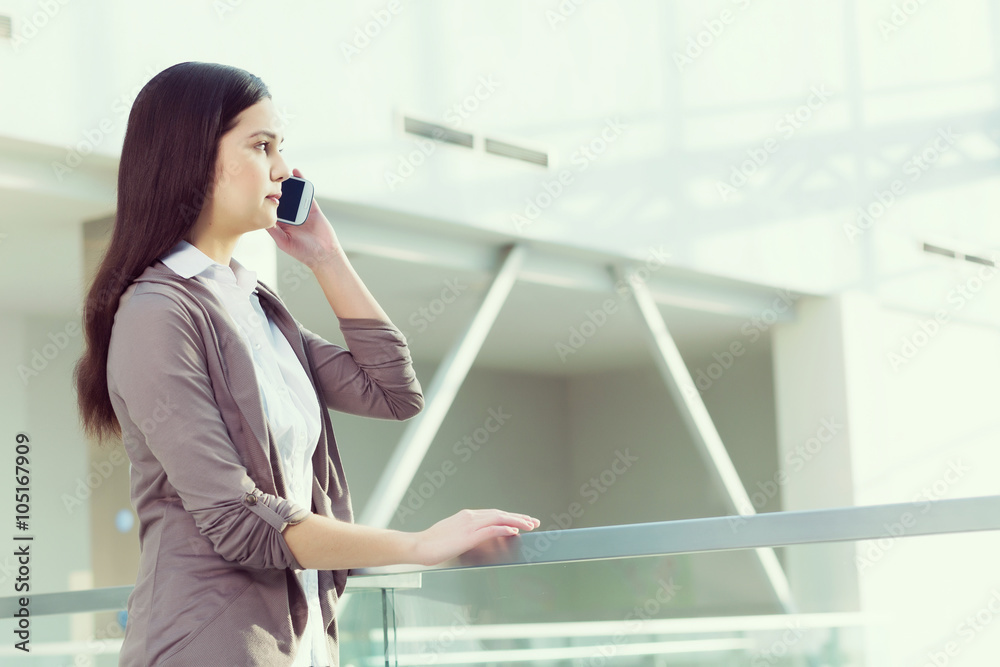 Attractive woman in office building Attractive woman in office building