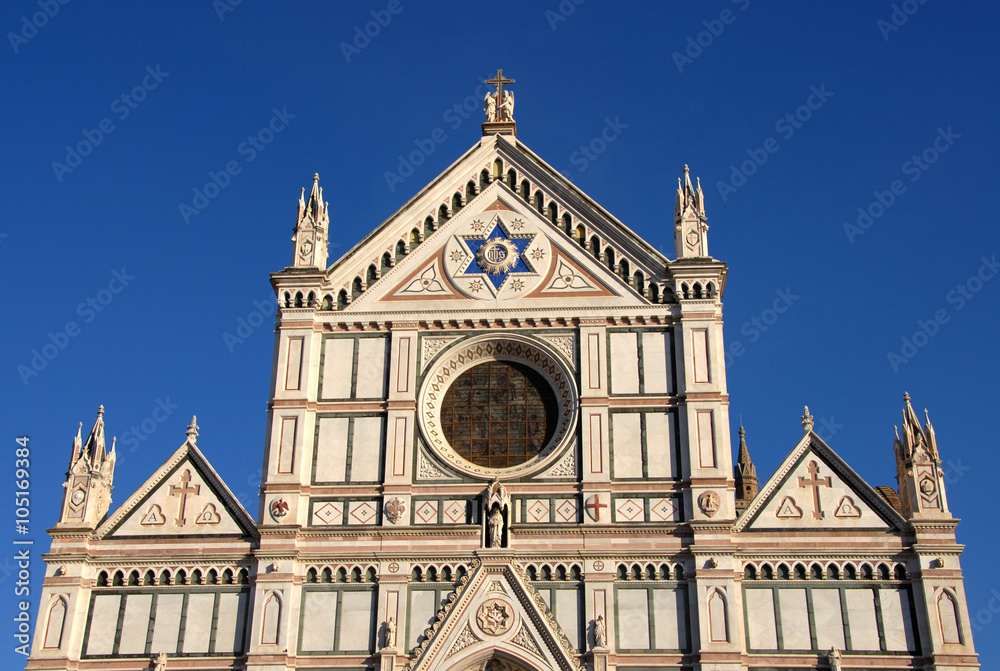 Santa Croce (Holy Cross) facade in Florence with Franciscan, Jesus symbols and Star of David