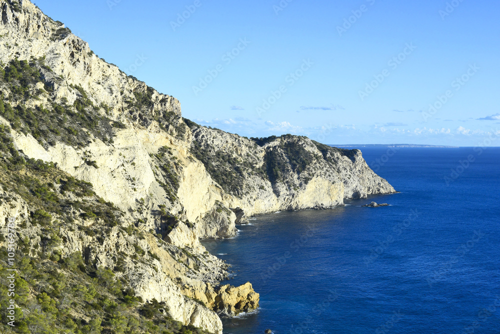 Cliff coast and blue sea