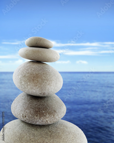 Balanced stones  sunny sea scene 