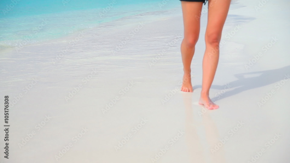 Woman walking on the beach, body part, barefoot lady on sandy beach, relaxation on tropical resort, summer vacation concept. Full HD Video 1920x1080 Woman walking on the beach, body part, barefoot lady on sandy beach, relaxation on tropical resort, summer vacation concept. Full HD Video 1920x1080