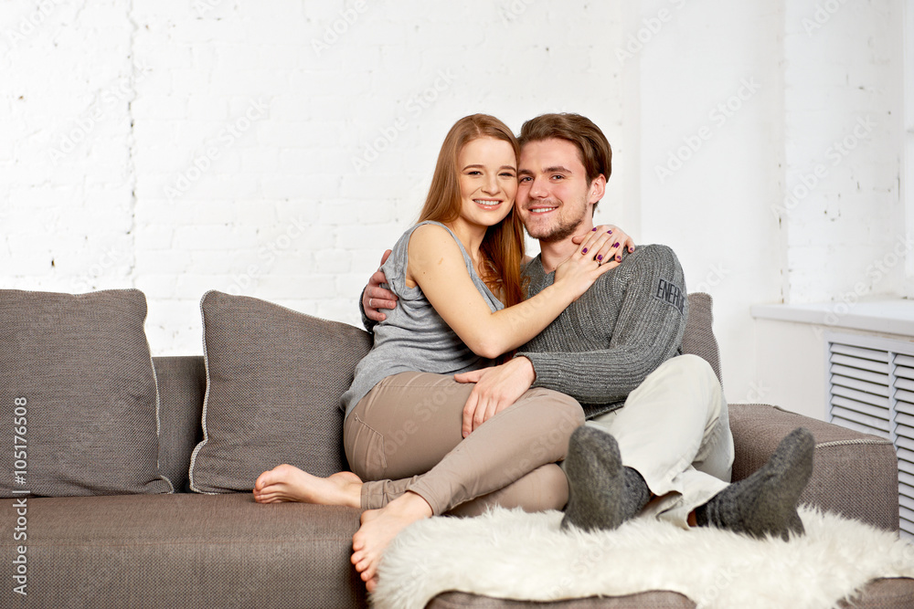 Young couple on the sofa Young couple on the sofa