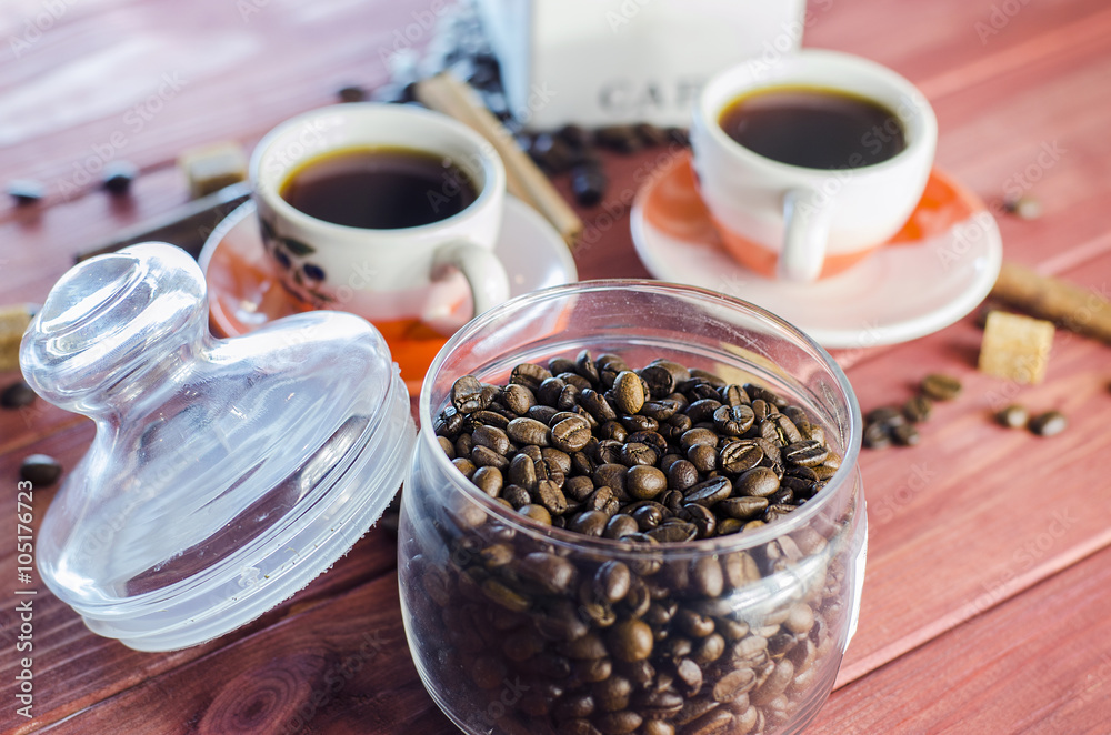 brewed coffee and coffee beans with cinnamon brewed coffee and coffee beans with cinnamon