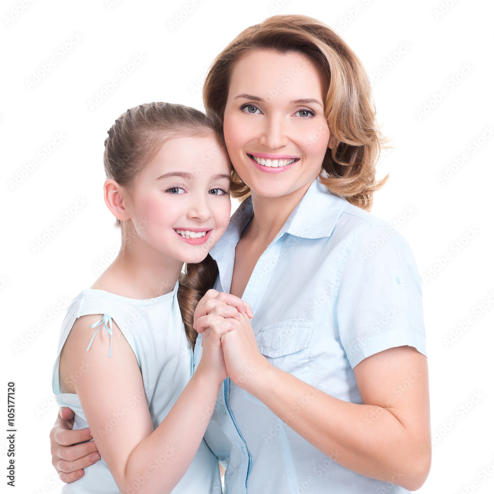 Closeup portrait of happy mother and young daughter Closeup portrait of happy mother and young daughter