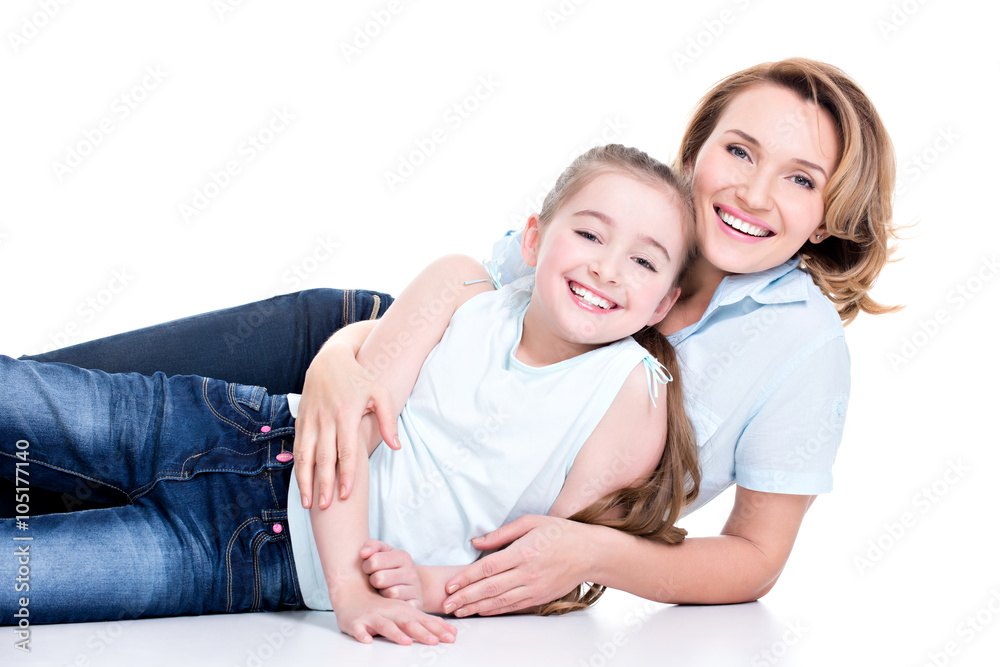 Portrait of smiling mother and young daughter Portrait of smiling mother and young daughter