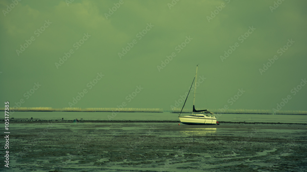 Fototapeta premium Boat in sunset, color effect