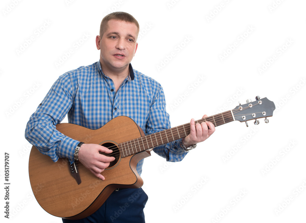 man holding a guitar and singing man holding a guitar and singing