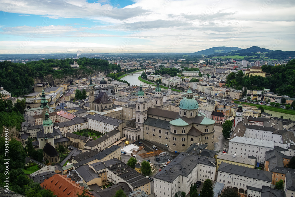 Aerial view of the historic city of Salzburg at fog and cloudy weather, Salzburgerland, Austria