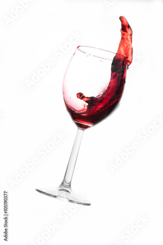 Red wine spilling out from grass